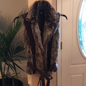 XOXO brown fur vest with tie belt.